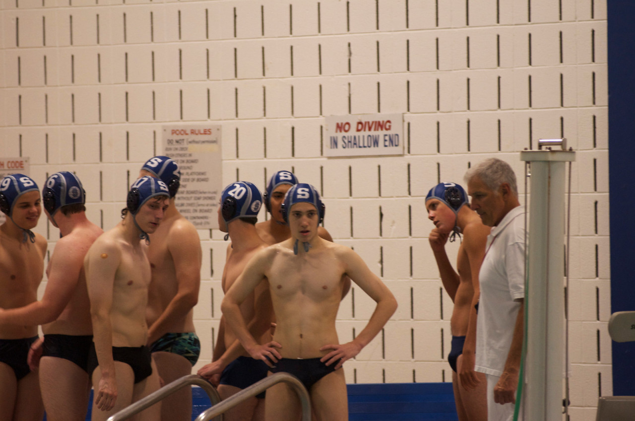 brobulges:  the guy third from the left and the guy second from the right. ;)