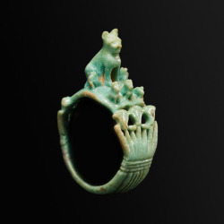 centuriespast:  Ring with Cat and KittensPeriod:Ramesside/Third Intermediate PeriodDate:ca. 1295–664 B.C.Geography:From EgyptMedium:Faience the met 