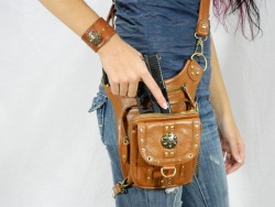 lordhigharchdukeofcrieffstonia:  whitfit:  begentlewithmewatson:  satdeshret:  warriorcreek:  The Warrior Pack purse line. There are 8 different ways you can wear the purse (handbag, purse, thigh holster, shoulder holster, messenger bag, backpack, fanny