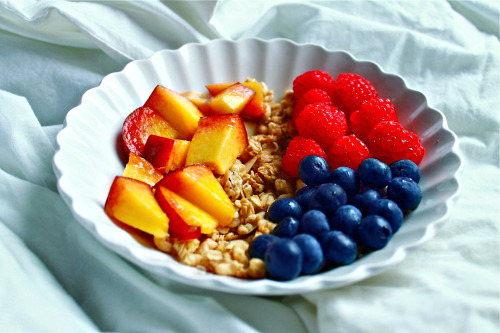 Yummy Summer breakfast of flax plus vanilla almond granola, unsweetened almond milk, ½ a peac