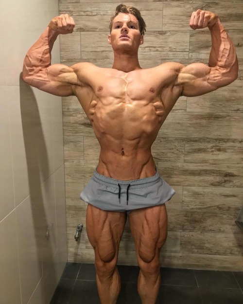 bicepsinsleeves:I Don’t know what I like more, His Massive Arms, the amazingly wide Lat’s Spread, his Gigantic Pecs, Washboard Abs, or those tree trunk legs! @Carltonloth is a perfect 10/10