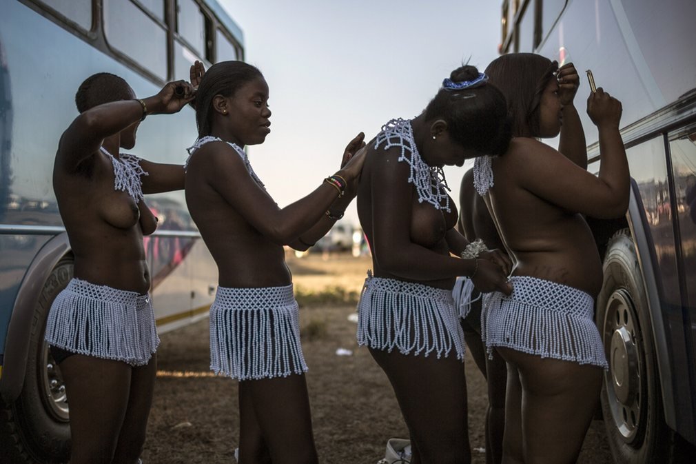     Zulu women at the reed dance. Via The Guardian.      Girls prepare each other