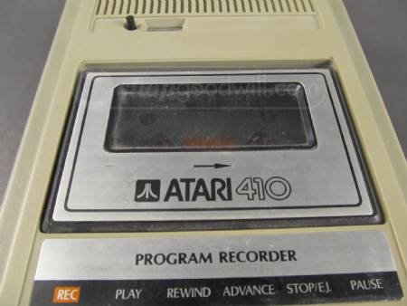 cassetteplayers:  Atari 410 Program Recorder Cassette Recorder. The REC button will not push down, and it does not move on play, the rewind, advance and stop/eject functions seem to work. Model 410 - measures 6.5" x 9.5" 