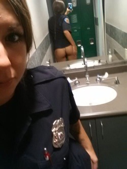 sandinmycrack:  Cute cop bored at the station