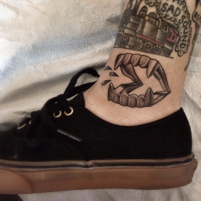 Mikaelas vampire fangs  Dollys Skin Art Tattoo Kamloops BC