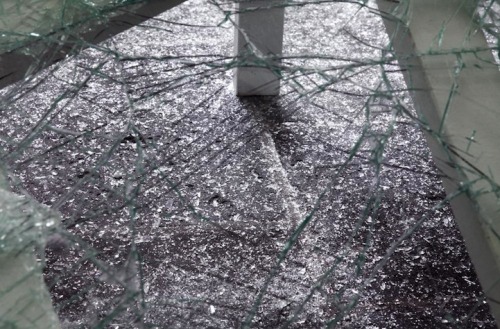  Aerial | Baptise Debombourg. Shattering glass flooding into a room of Brauweiler Abbey in Germany. 