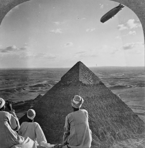 A Zeppelin flying over the Great Pyramids, 1931.