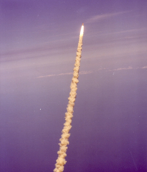 humanoidhistory:On its maiden flight, the Shuttle Challenger hurtles toward space, April 4, 1983.