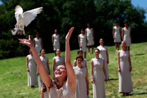 Greek girls as ancient priestesses during the annual Olympic lighting ceremony in Ancient Olympia, C