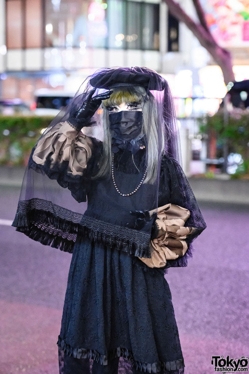 Japanese shironuri artist Minori on the street in Harajuku wearing handmade, remake, and vintage fas