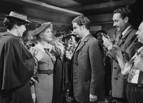 eddyentropy:Robert Donat, Greer Garson, Paul Henreid, Scott Sunderland, Austin Trevor, and John Mill