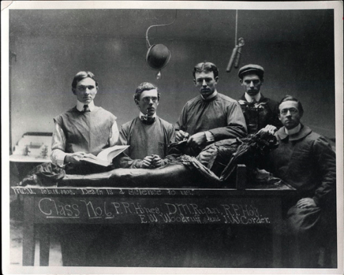  Medical students from the Medical College of Virginia at the dissection table in Anatomy lab (1898-1910). 