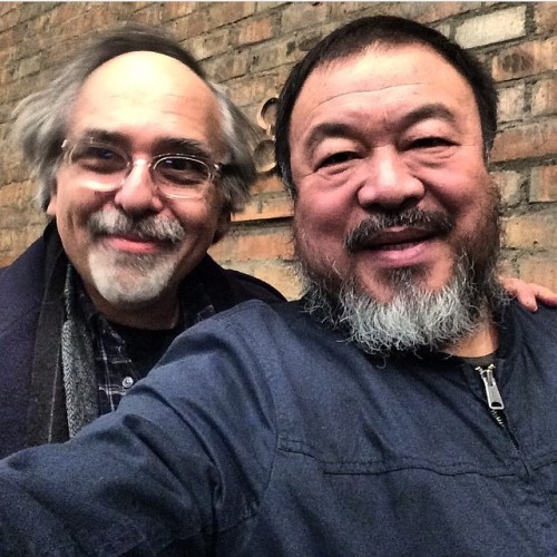 Two great artists, each smiling, but the moment is poignant when ai weiwei is under house arrest. (a