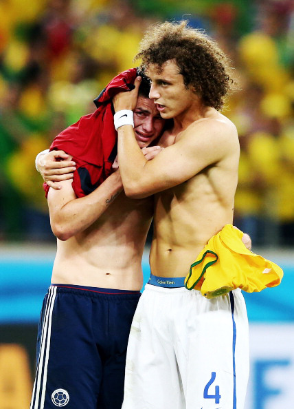 louistomlinshitt-deactivated201:  James Rodriguez  of Colombia is consoled by David Luiz of Brazil after the 2014 FIFA World Cup Brazil Quarter Final match between Brazil and Colombia at Estadio Castelao on July 4, 2014 in Fortaleza, Brazil. 