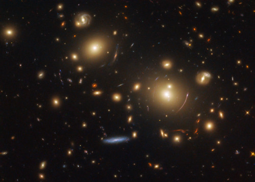 Hubble Peers into the Vast Distance : This picture showcases a gravitational lensing system called S