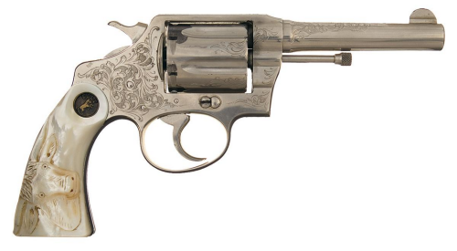 Factory engraved nickle plated Colt Police Positive with carved and monogrammed pearl grips. Produce
