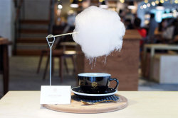 sixpenceee:  Cafes in China serve coffee with a cloud of cotton candy hanging above the cup so it slowly rains sugar into your drink. The coffee vaper rises to dissolve the cotton candy and the cloud begins to rain with sugar over the drink. (Source)