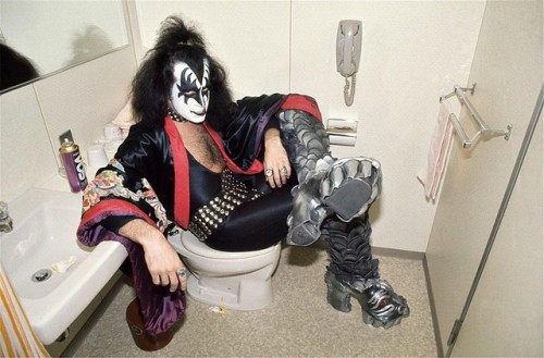 ALLACCESS-INSPIRATIONTOILETGENE SIMMONS OF KISS POSING IN A BATHROOM DURING THEIR TOUR OF JAPAN, 197