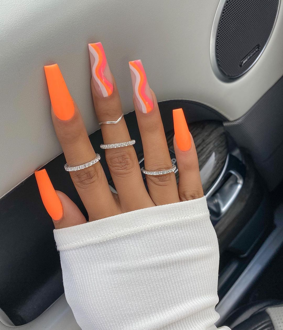 Image tagged with neon orange neon nails lv on Tumblr