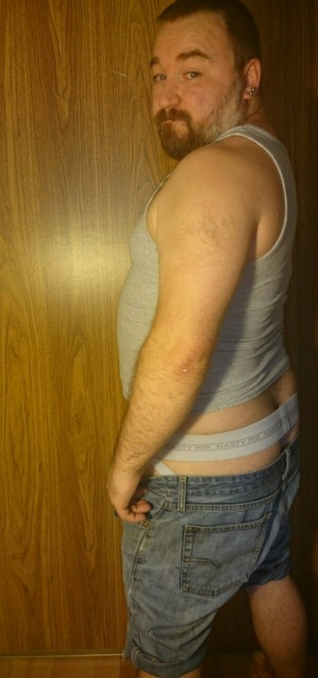 cuddlecubottawa:  I had a request for seeing me model in my favourite outfit. Somehow if was deleted but I took some pics anyways. This tank top is a bit tight around the belly, it makes me feel fat and I like that. These Jean shorts are probably the