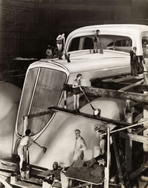 Cleaning the giant Studebaker on display at the Century of Progress World’s Fair, 1933, Chicago.