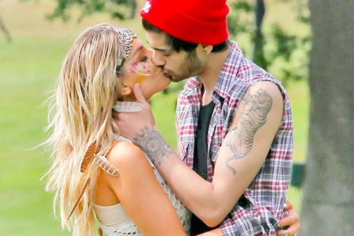 harrystylesdaily:  Zayn and Perrie sharing a loving embrace at her birthday funfair