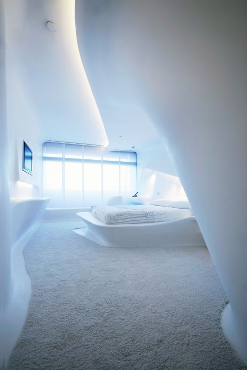 luxuryaccommodations:  Zaha Hadid Floor at Silken Puerta América Madrid One of the highlights of Madrid’s Hotel Puerta America is the floor designed by Zaha Hadid - the first woman awarded with the prestigious Pritzker Architecture Prize. Combing her