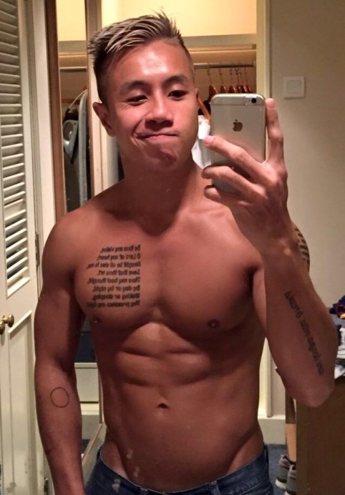 sghard: chillaxjay01:  evianguy:  Hawt Asian Stud!  Nice ink and hot nipples!  Lots of hot things on