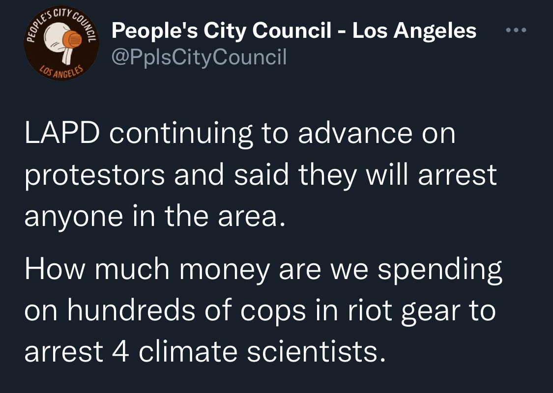 chismosite:April 6, 2022LAPD show up in riot gear to a climate protest against JPMorgan