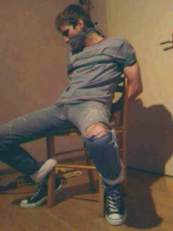 soxnties:  chairtiedguys:  This guy was once on www.recon.com years ago but is no longer there, for the life of me I cannot remember his name-something to do with Canucks I think. But he looks very hot squirming in that chair ;-)  The photos are terrible