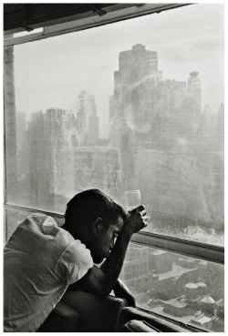 languagethatiuse:  Mr. Sammy Davis Jr. looking down below the New York City skyline. Photography by Burt Glinn.  
