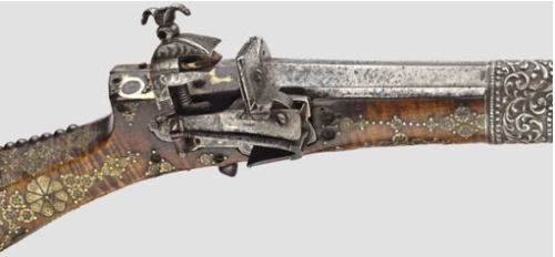 Ornate Turkish miquelet musket decorated with bone, brass, and silver, 19th century.