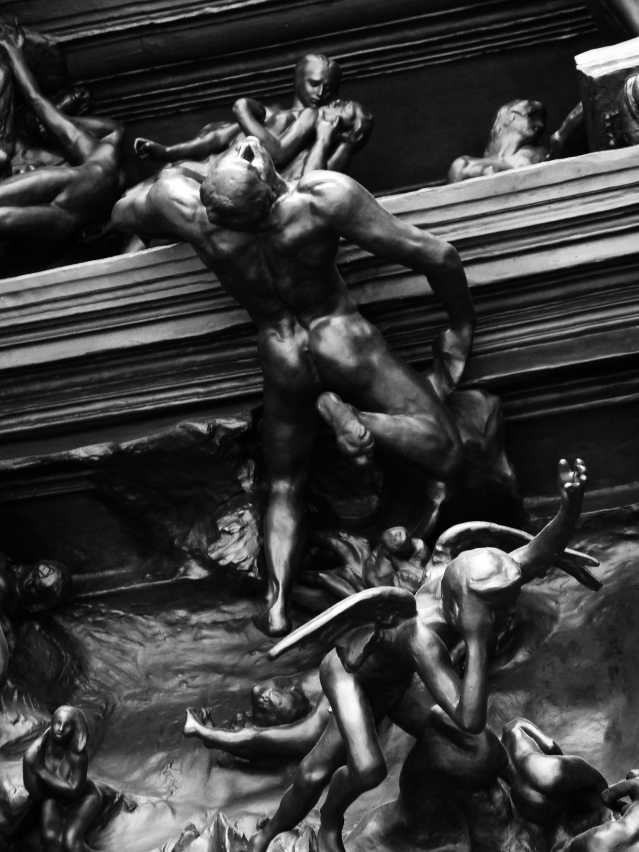 outerground:  Details from The Gates of Hell by Rodin. Bronze doors originally commissioned