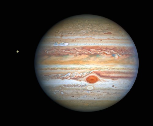 space-pics:Hubble’s Crisp New Image of Jupiter and Europa by Hubble Space Telescope / ESA