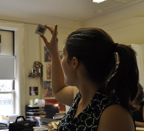 Collections management intern Jennifer Torres and volunteer Elizabeth Campos are organizing and pack