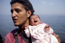 whatneverchanges:  ‘Babe in Arms’ [and water][1] Syrian refugee and his one month old daughter arriving on a dinghy in Greece[2] Kosovo man and his baby as he crosses Hungarian-Serbian border [Reuters] 