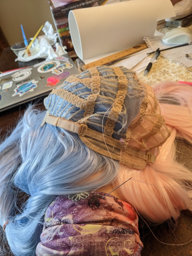 Wig splicing progress shots. It didn't turn out half bad in the ! It's holding together, at least. I'm kinda afraid to style 