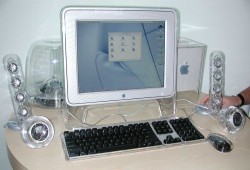 y2kaestheticinstitute:  Power Mac G4 Cube with Apple Pro Mouse, keyboard, Harman Kardon speakers, and Studio Display (2000)