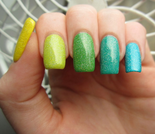 Green ombre nails. More original nail art.