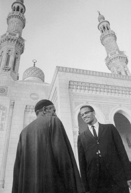 islamic-art-and-quotes:  Malcolm X in Mecca Filed under: Photos of Minarets