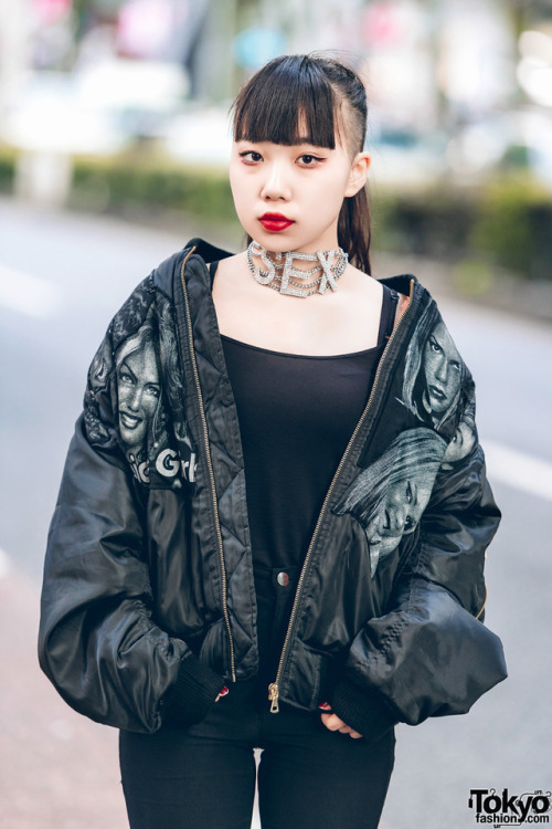 17-year-old Japanese high school student Beni on the street in Harajuku wearing a black bomber jacke