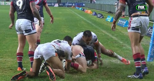 scrumjock: Splash!!  Sydney City Roosters arse exposed on a wet day in the NRL