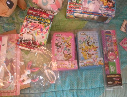 so here’s that big package i was expecting from japan !! i’m so excited, i’m freaking out, Bijou is here to help me open the box      aaaaahhhh new precious items for my Sylveon collection   I’m going to take more detailed photos