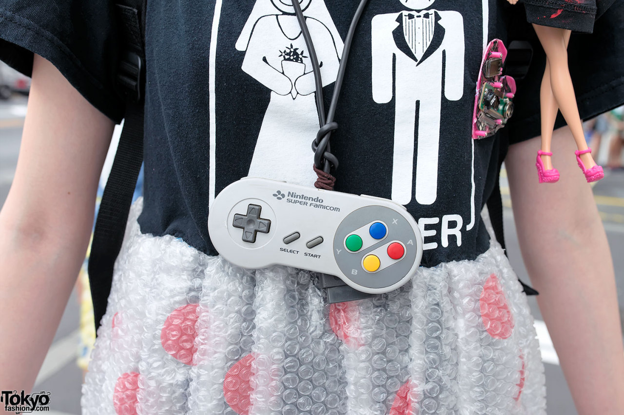 tokyo-fashion:  17-year-old Nontan on the street in Harajuku with a game-themed look