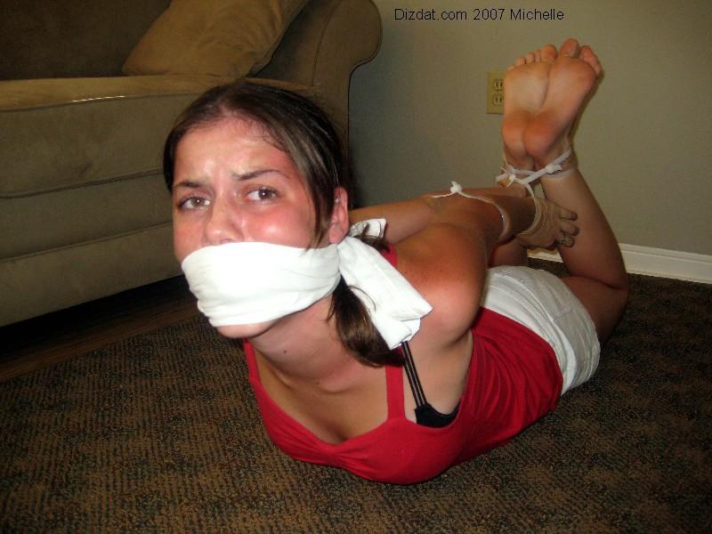 zippo077:  Ziptied into a tight hogtie by a burglar, Michelle could barely move and