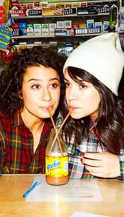 ilanawexler:  Abbi Jacobson and Ilana Glazer photographed by Peter Yang.  Omg riding tandem bikes, drinking forties…would be the best date ever.