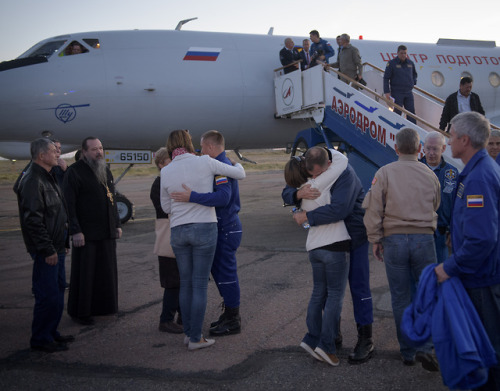 Crew of Soyuz MS-10 reunite with family members following the launch anomaly of the spacecraft and b