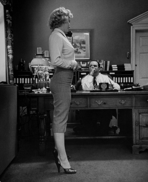 Marilyn Monroe at producer Jerry Wald’s office. Wald interviewed her for a role in Clash By Night (w