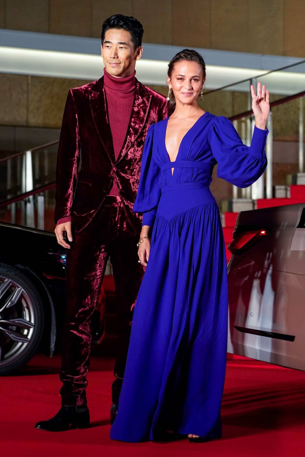 H o l l y w o o d  F a s h i o n — Alicia Vikander (in Louis Vuitton) and  Naoki