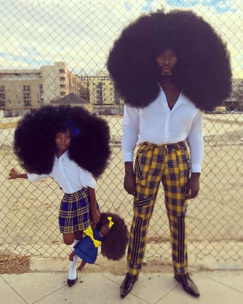 sartorialadventure:    Benny Harlem, an aspiring singer, songwriter, and model, holds the Guinness Book of World Records’ title for tallest high top afro at 52.07 cm (20.5 inches). Photos with his daughter Jaxyn have taken social media by storm.